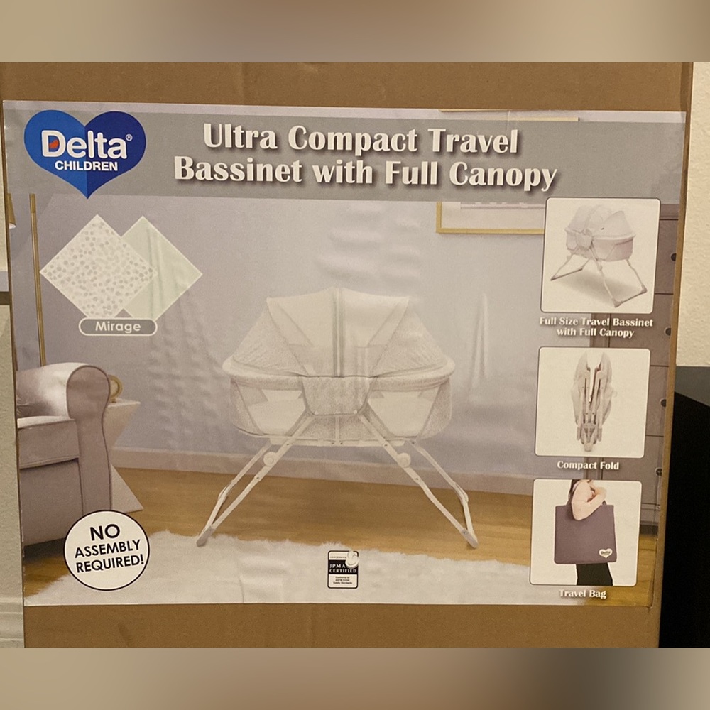 Brand new still in box travel bassinet